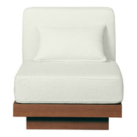 White upholstered chair with a smooth texture and a contrasting wooden base. Modern and minimalistic design.