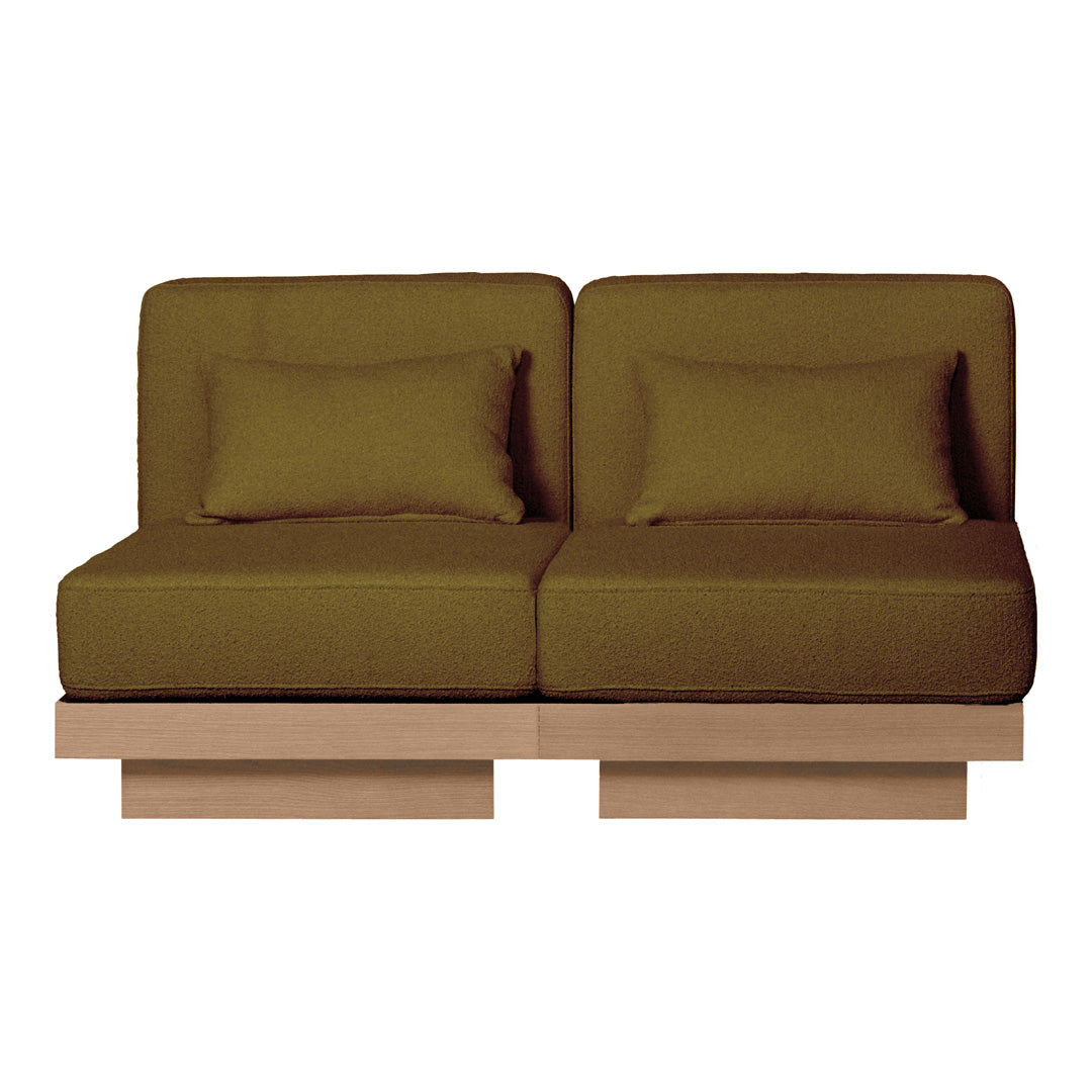 Olive green sofa with two cushions, featuring a minimalist wooden base. Stylish and contemporary design.