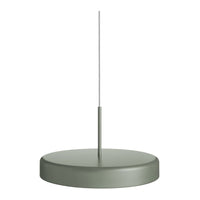 Round green pendant light with a minimalistic design and sleek metal finish. Perfect for modern decor.