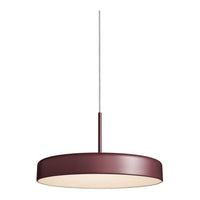 Round pendant lamp with a sleek burgundy shade and soft white diffuser, creating a modern style.
