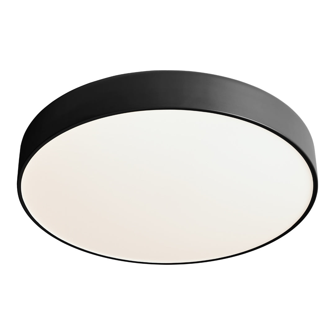 Black circular ceiling light fixture with a smooth white diffuser, elegant and modern design for versatile decor.