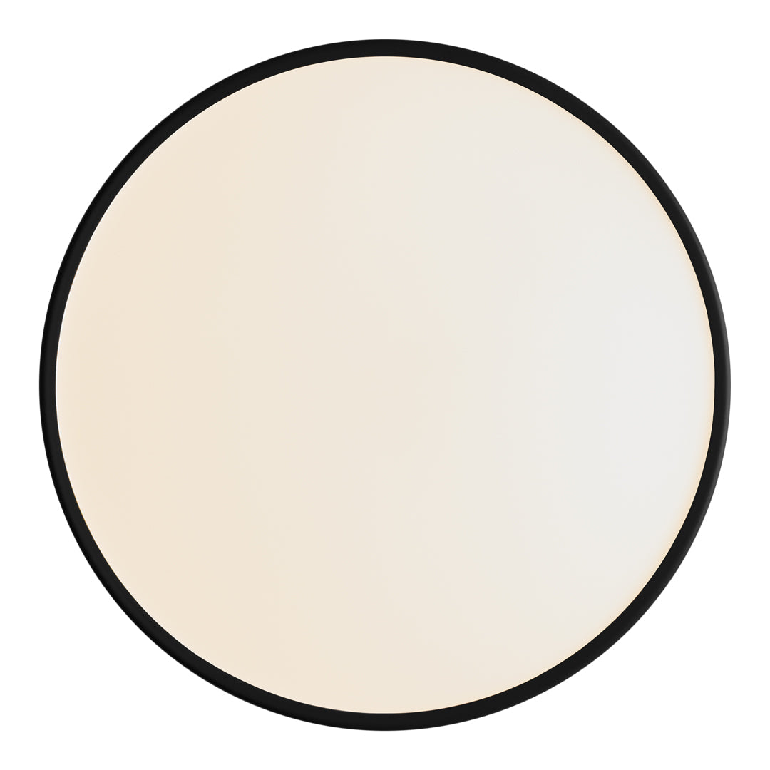 Round mirror featuring a soft beige hue with a sleek black frame. Minimalist design for modern decor.