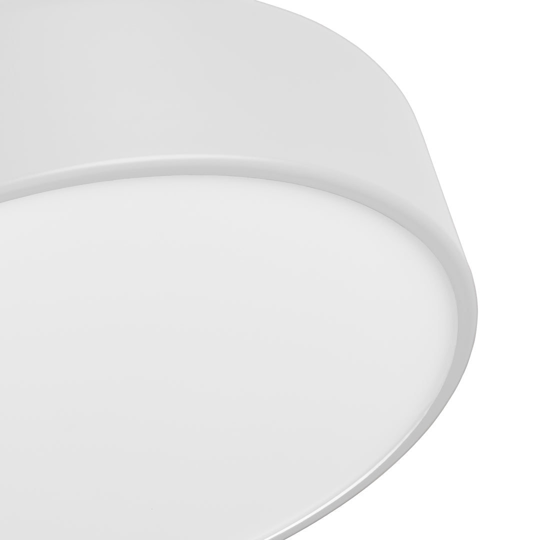 Round, smooth white ceiling light with a minimalist design and glossy finish. Ideal for modern interiors.
