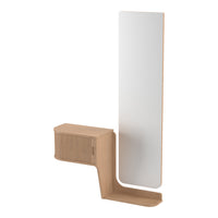 Modern wooden vanity unit in light natural tones, featuring a sleek white mirror and subtle linear patterns.