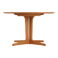 Wooden dining table with a sleek, natural finish and a minimalist design featuring clean lines and sturdy legs.