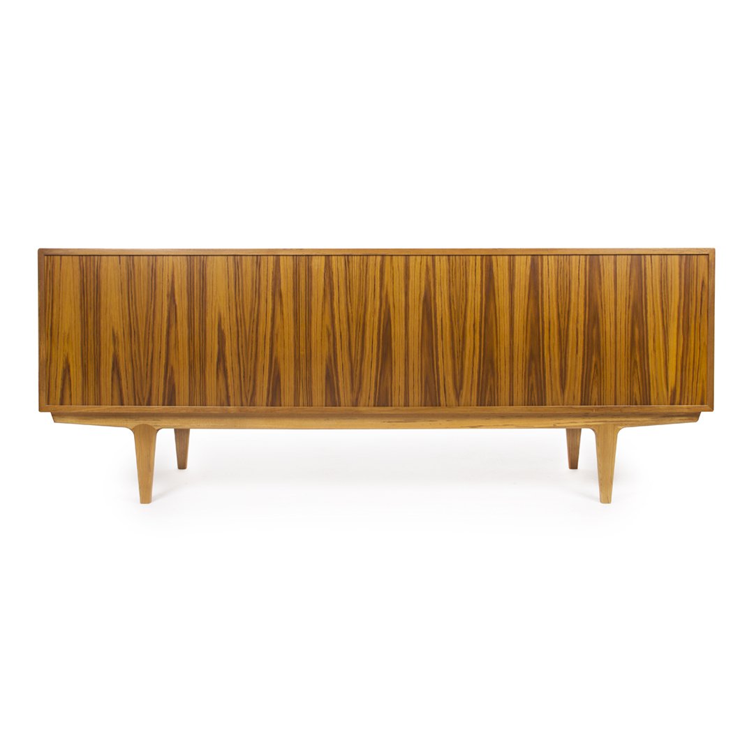 Mid-century wooden sideboard with rich walnut finish and vertical grain pattern. Elegant, smooth design complements any decor.