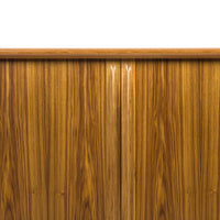 Warm golden-brown wood with a smooth finish and fine linear grains, showcasing a modern and elegant look.