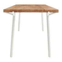 Stylish wooden tabletop with a warm oak finish and sleek white legs, perfect for modern decor.