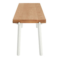 Light oak wood table top with natural grain pattern and sleek white legs for a modern look.