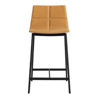 Tan upholstered bar stool featuring a quilted pattern and sleek black metal legs. Ideal for modern decor.