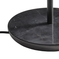 Black marble lamp base with subtle gray veining and a sleek matte finish. Contemporary design with a minimalist aesthetic.