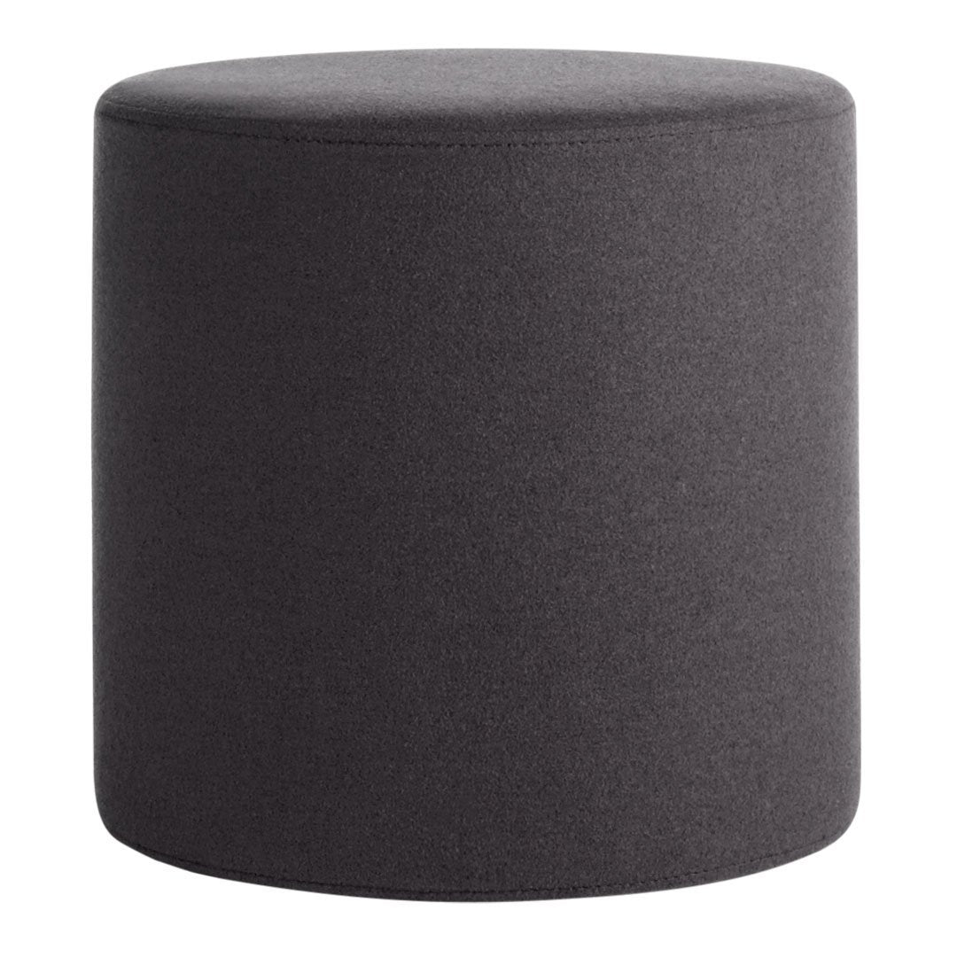 Round charcoal gray upholstered ottoman with a simple solid pattern. Perfect for modern decor.