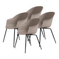 Set of four taupe modern chairs with sleek black metal legs, showcasing a minimalist design and smooth, curved contours.