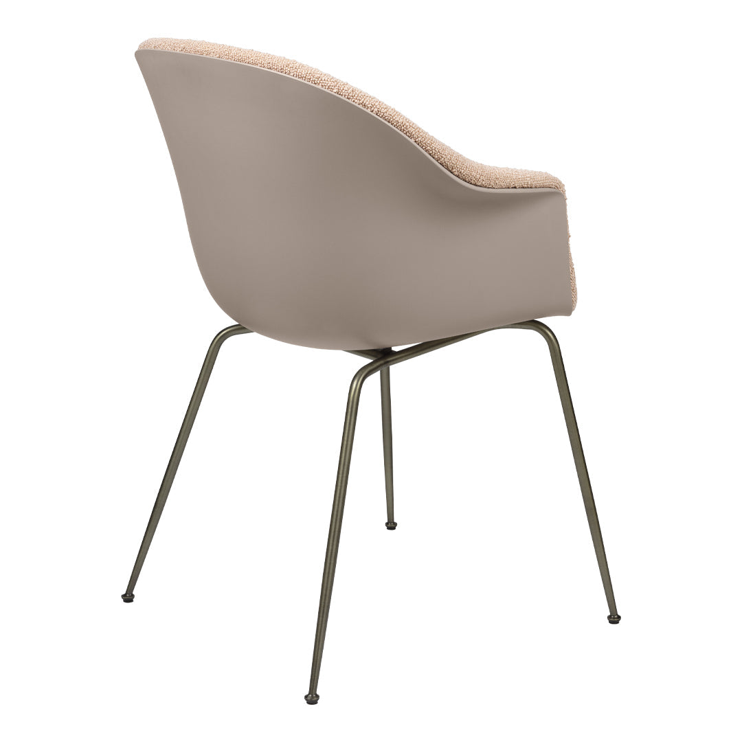 Beige upholstered chair with a textured back and sleek metal legs, showcasing a modern, minimalist design.