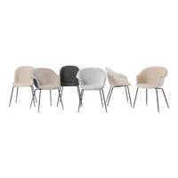 "Collection of modern chairs in beige, gray, and white with a smooth finish and sleek metal legs, showcasing versatile styles."