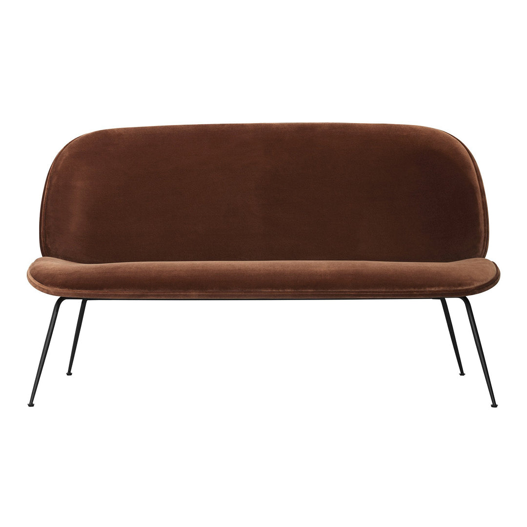 Brown velvet sofa with a minimalist design and sleek black metal legs, perfect for modern interiors.