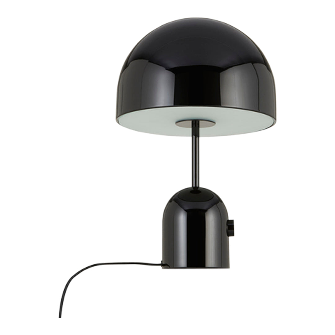Modern black table lamp with a glossy finish and sleek dome shape, featuring contrasting white underside.