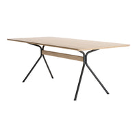 Light wood tabletop with a smooth finish and black metal legs, showcasing a modern minimalist design.
