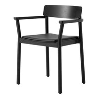 Simplistic black chair with a smooth surface and clean lines, perfect for modern decor. 