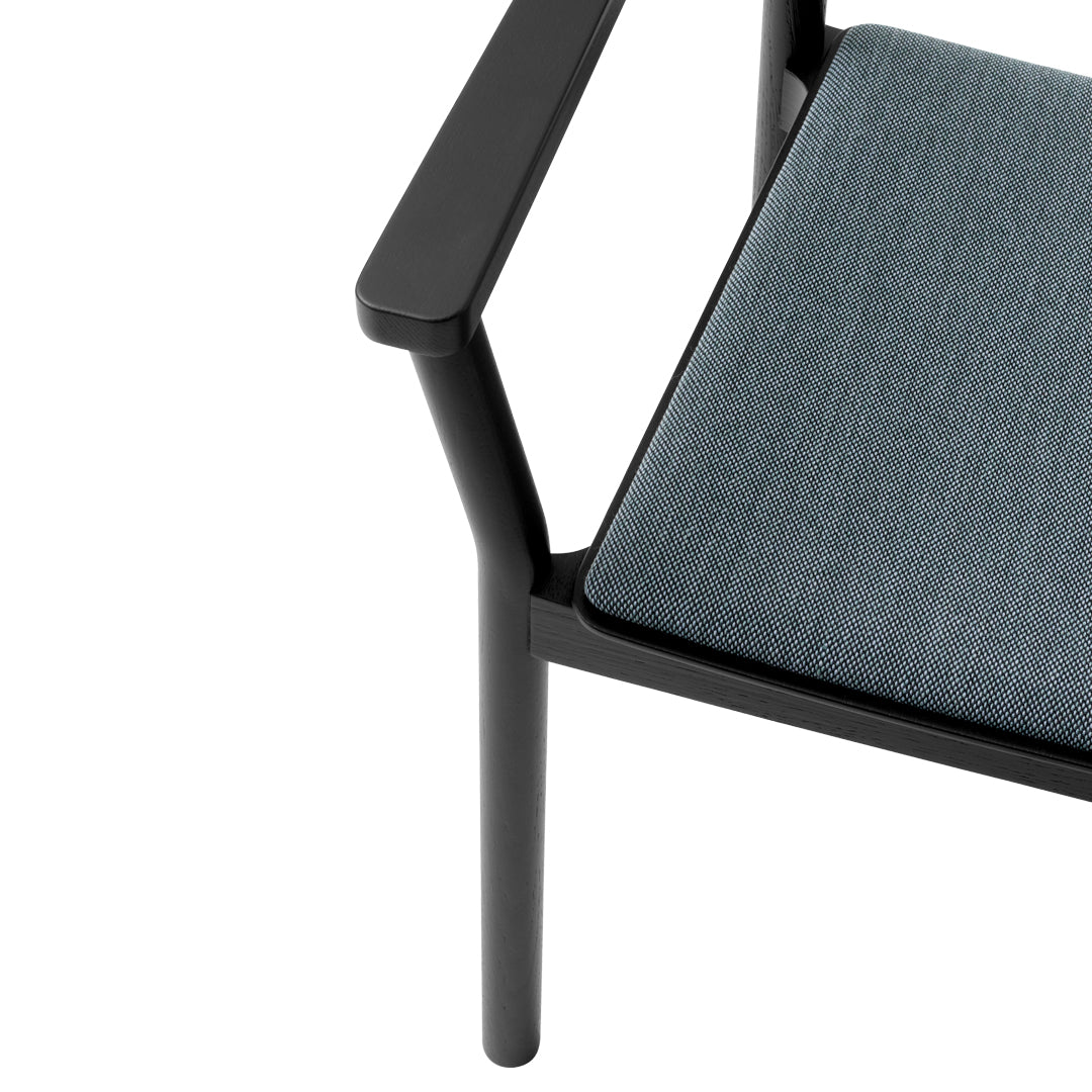Sleek black frame with a textured dark blue cushion, showcasing modern elegance and minimalist design.