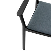 Sleek black frame with a textured dark blue cushion, showcasing modern elegance and minimalist design.