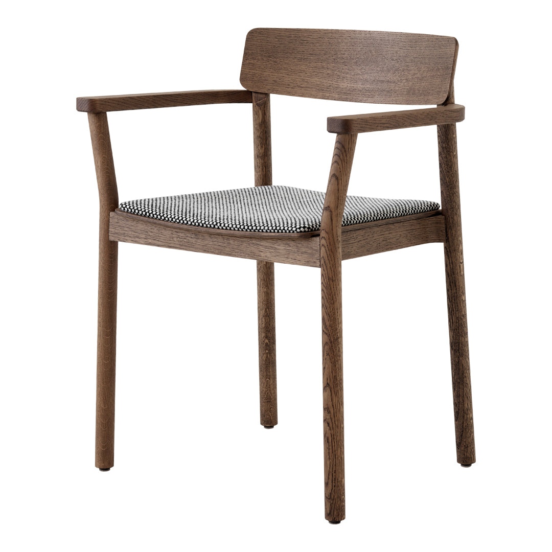 Wooden chair with a rich brown frame and a textured gray and white patterned seat cushion.