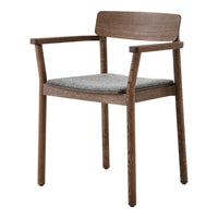 Wooden chair with a rich brown frame and a textured gray and white patterned seat cushion.