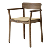 Light beige seat cushion with a rich brown wooden frame and smooth, minimalist design. Perfect for modern interiors.