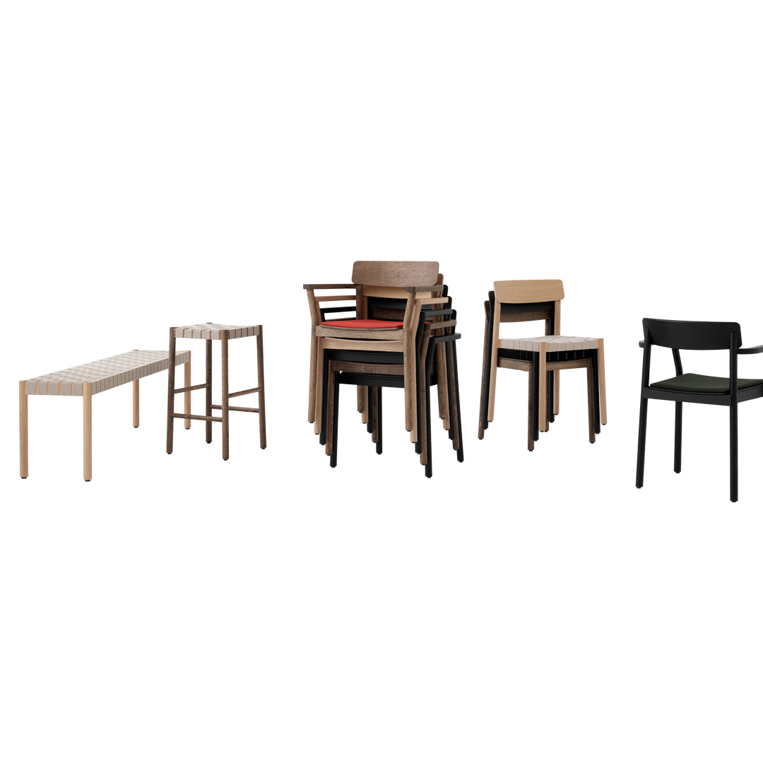 "Stacked chairs in natural wood, black, and two-tone designs, with a sleek, minimalist bar table in light wood."