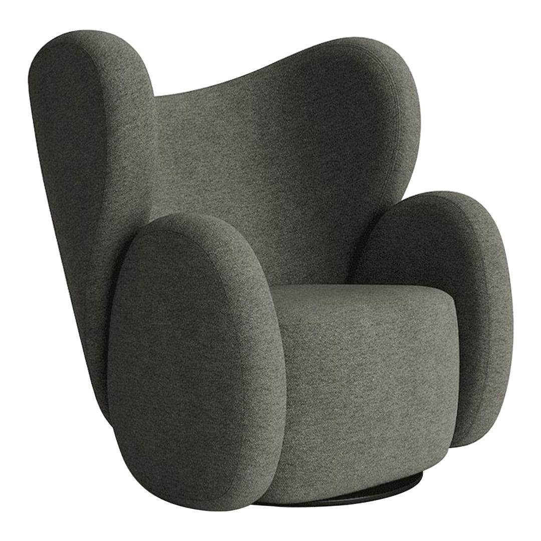 Gray upholstered chair with smooth curves and a modern design, featuring a soft texture and minimalist aesthetic.