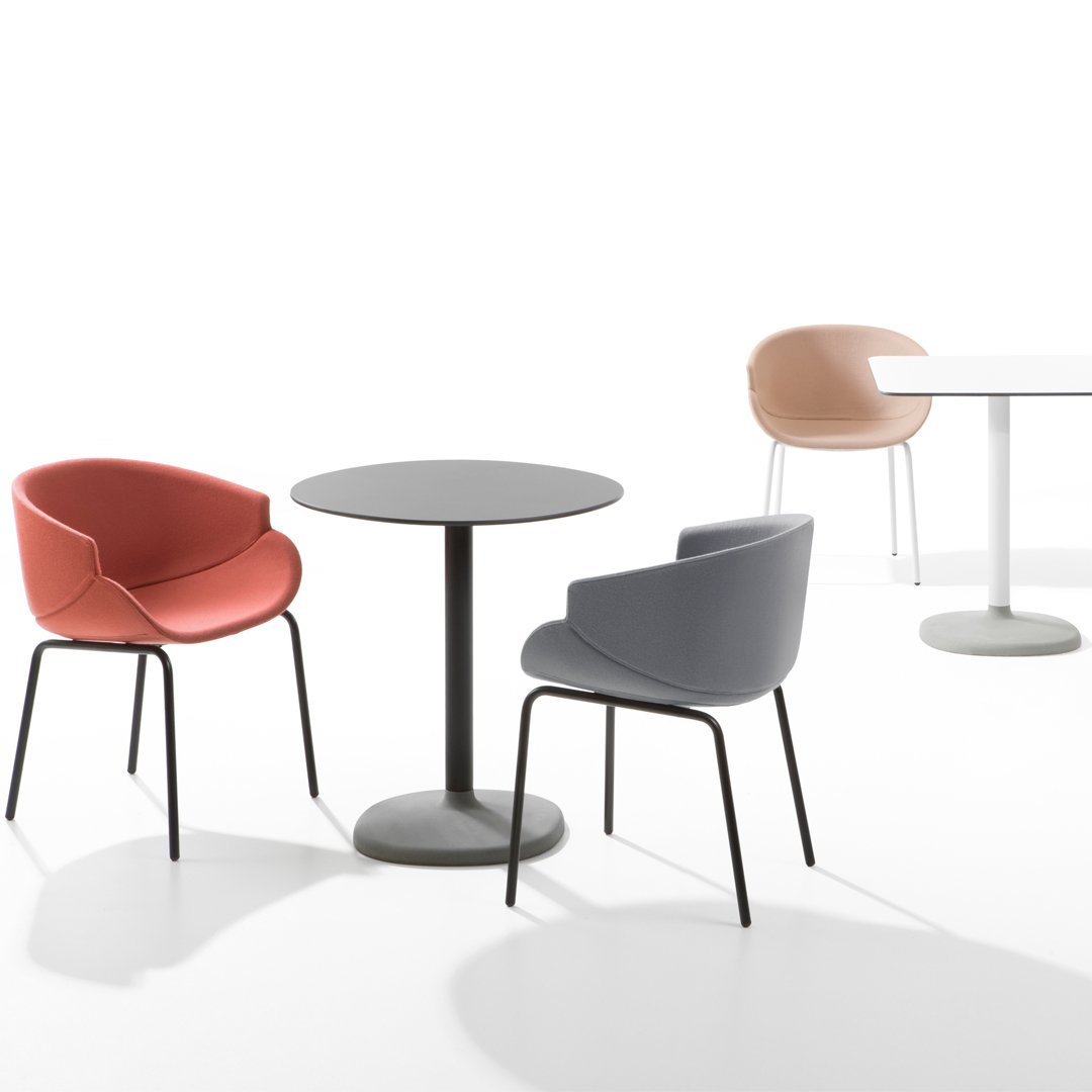 Contemporary seating with coral, gray, and beige chairs around sleek round tables; minimalist design, soft color palette.