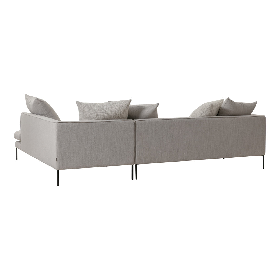 Light gray modular sofa with smooth fabric and minimalist design, featuring plush cushions and sleek metal legs.