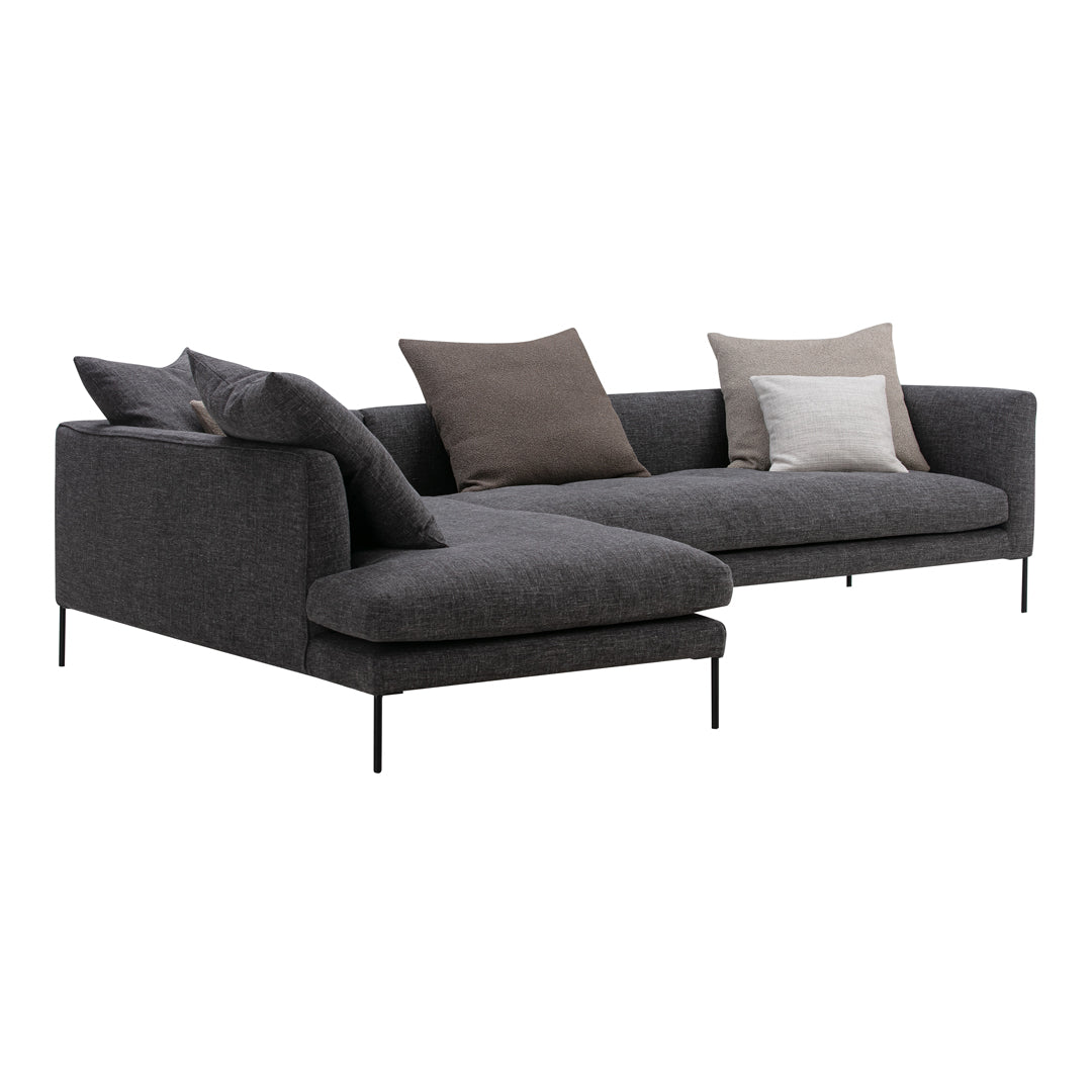 Modern gray sectional sofa with soft textures and subtle decorative pillows in neutral tones. Perfect for stylish living spaces.