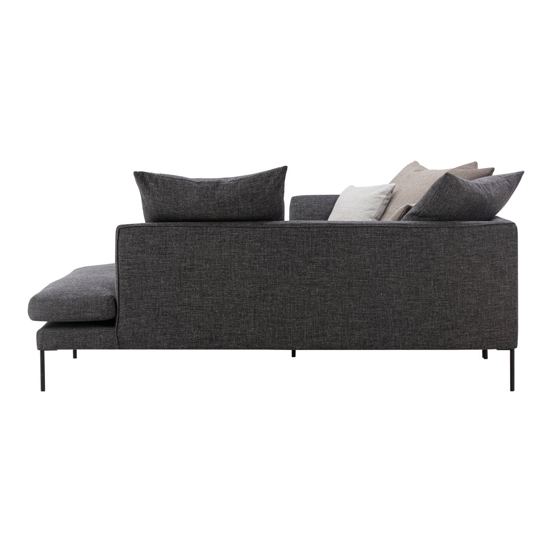 Modern gray sofa with textured fabric and accent pillows in neutral shades. Clean lines and minimalist design.