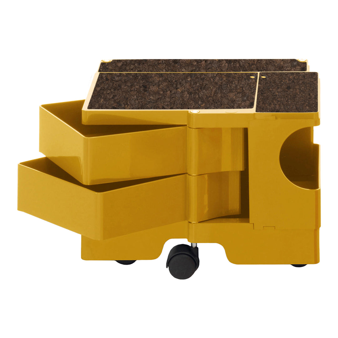 Yellow storage cart with three spacious drawers and a dark cork top, featuring a sleek, modern design.