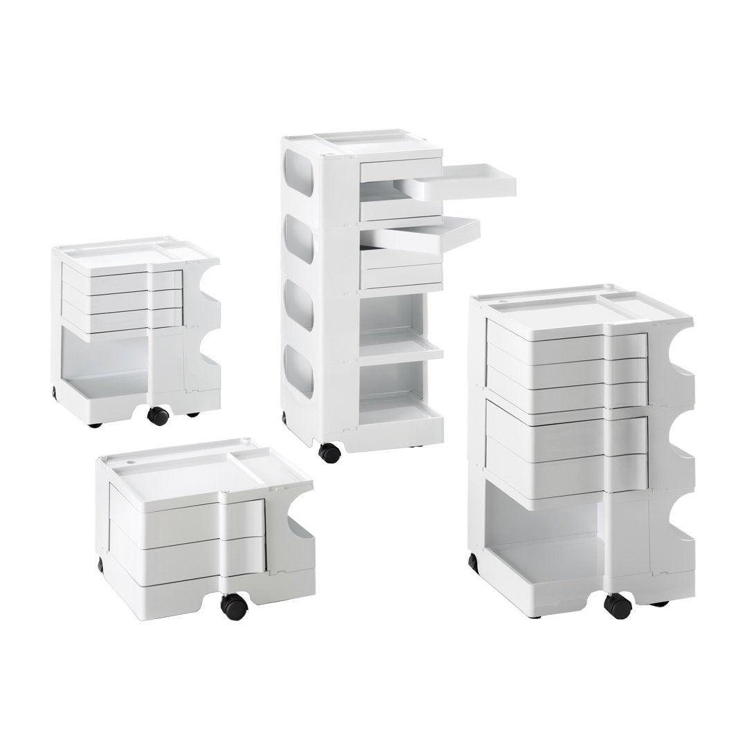 White storage carts with smooth surfaces and simple, modern lines, featuring pull-out drawers and wheels for mobility.