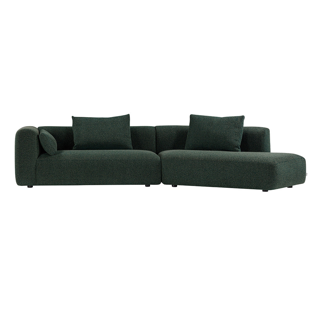 "Dark green sectional sofa with smooth fabric and clean lines, featuring coordinating cushions for added comfort."