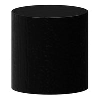 Black cylindrical accent table with a smooth, glossy finish and minimalist design. Ideal for modern decor.