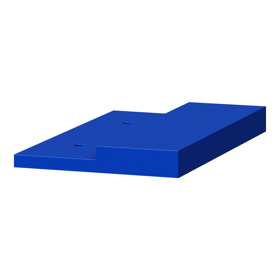 Solid blue rubber mat with smooth surface, featuring a unique cut-out corner design for versatile use.