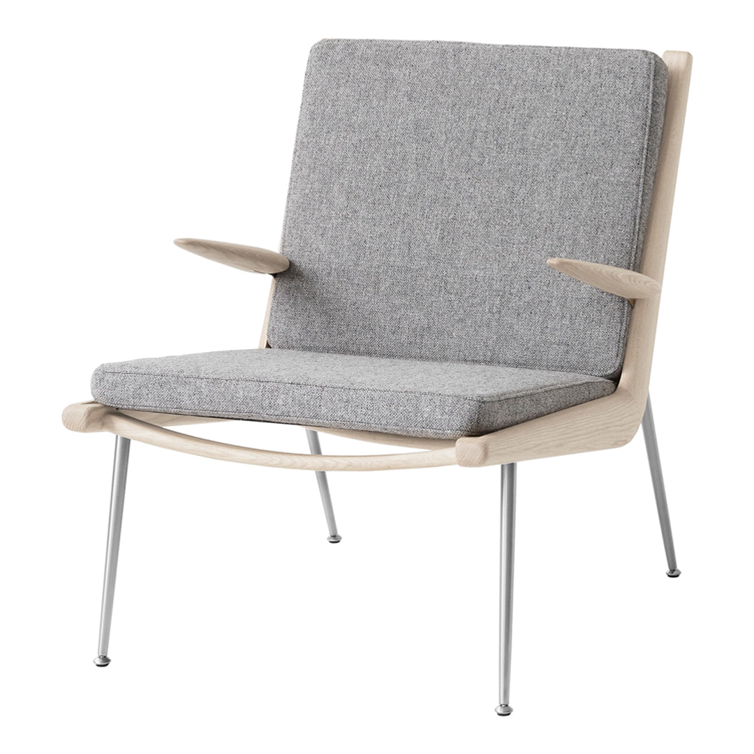 Gray upholstered chair with light wood frame and silver metal legs, featuring a minimalist design.