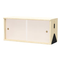Light wood cabinet with frosted glass doors and black triangular accents. Simple, modern design.