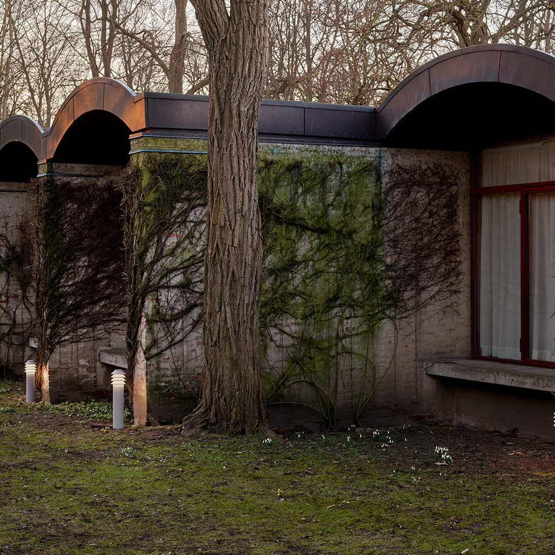 "Geometric patterns with earthy tones, featuring muted greens and browns in a natural, serene outdoor setting."