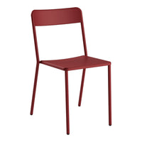 Red metal chair with a sleek, minimalist design and smooth, solid color finish. Perfect for modern decor.