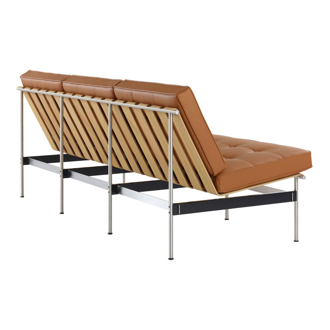 Brown leather sofa with a geometric wood slat pattern and silver metal frame, perfect for modern decor.
