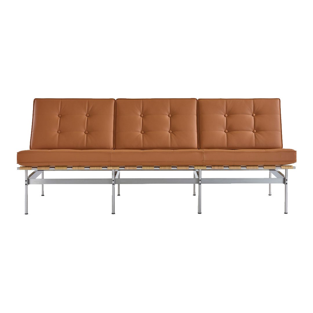 Brown tufted leather sofa with a sleek chrome base and minimalist design. Perfect for modern interiors.