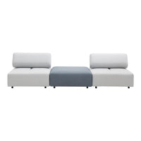 Modern sofa featuring a sleek white design with a contrasting blue center cushion. Minimalist style with clean lines.