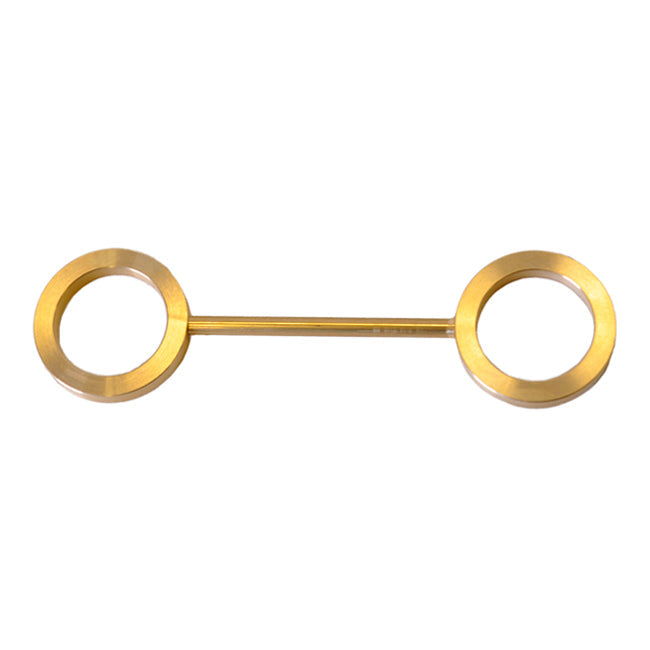 Golden metal connector with two circular openings, featuring a sleek, minimalist design. Perfect for modern decor.