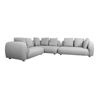 Gray sectional sofa with plush cushions and smooth fabric, featuring simple lines and a modern design.