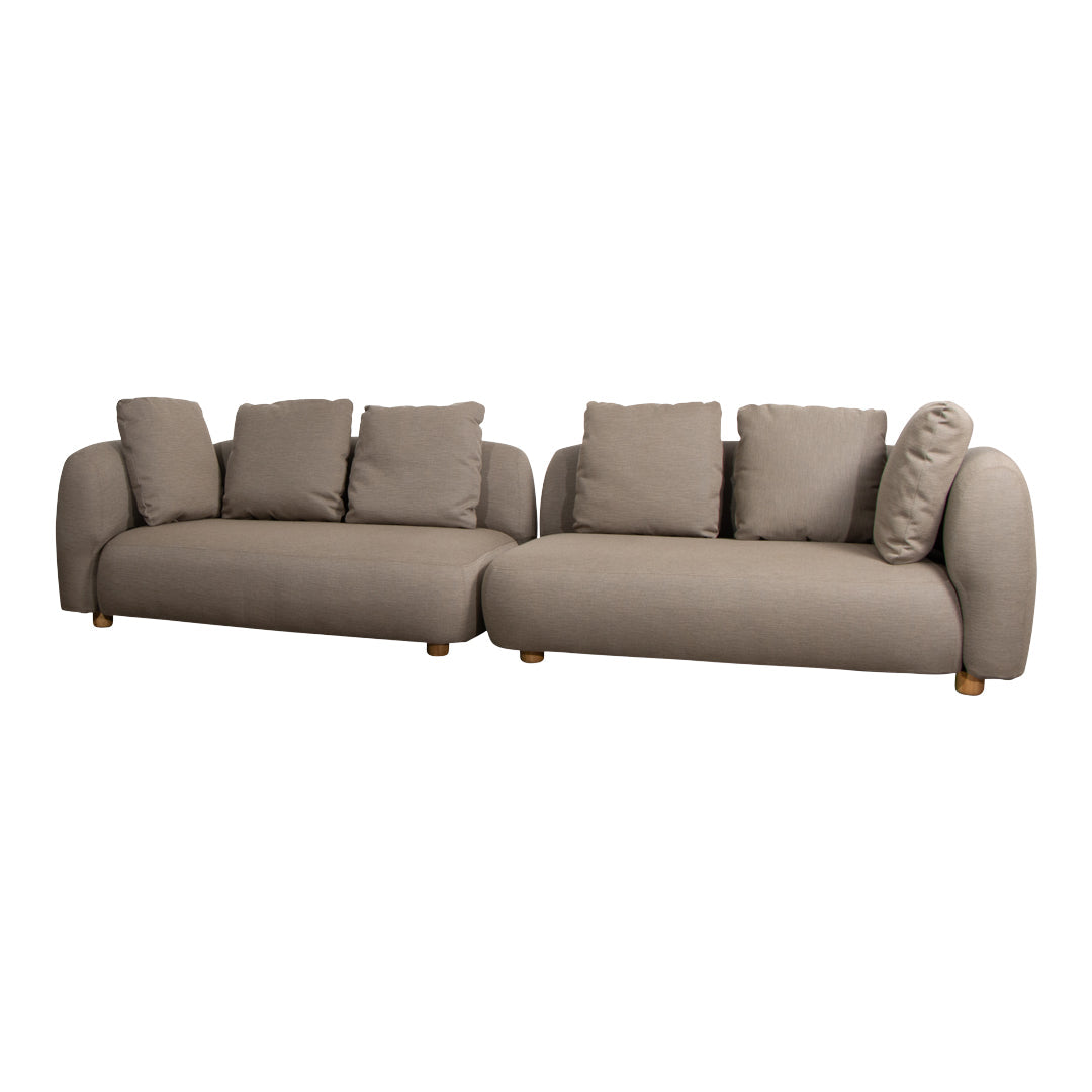 Modern beige sofa set with plush cushions and rounded design, perfect for stylish comfort in any living space.