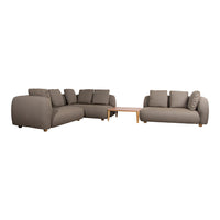 Beige sectional sofa with smooth fabric and subtle textured patterns, accented by plush cushions and wooden legs.